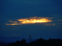 Black clouds are covering the sky at sunrise in Yichang, China, on July 18, 2024. (