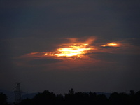 Black clouds are covering the sky at sunrise in Yichang, China, on July 18, 2024. (