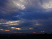 Black clouds are covering the sky at sunrise in Yichang, China, on July 18, 2024. (