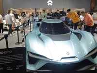 Visitors are viewing the NIO EP9 electric supercar at the 21st Changchun International Automobile Expo in Changchun, Jilin province, China,...