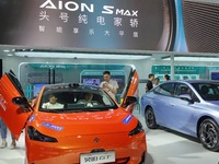 Spectators are viewing the HYPER GT electric car at the 21st Changchun International Automobile Expo in Changchun, Jilin province, China, on...