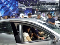 Visitors are visiting BYD's booth at the 21st Changchun International Automobile Expo in Changchun, China, on July 17, 2024. (