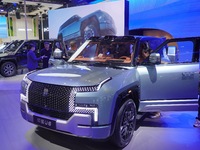 Spectators are visiting the BYD YANGWANG U8 electric car at the 21st Changchun International Automobile Expo in Changchun, Jilin province, C...