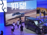 Spectators are visiting the BYD YANGWANG U8 electric car at the 21st Changchun International Automobile Expo in Changchun, Jilin province, C...