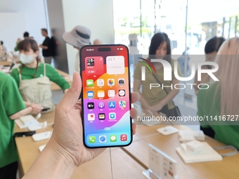 Customers are shopping for the iPhone 15 at the flagship store of Apple Smart Products on Nanjing Road Pedestrian Street in Shanghai, China,...