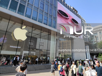 Customers are shopping for the iPhone 15 at the flagship store of Apple Smart Products on Nanjing Road Pedestrian Street in Shanghai, China,...