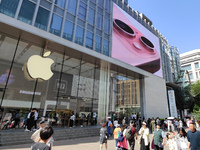 Customers are shopping for the iPhone 15 at the flagship store of Apple Smart Products on Nanjing Road Pedestrian Street in Shanghai, China,...