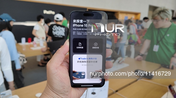 Customers are shopping for the iPhone 15 at the flagship store of Apple Smart Products on Nanjing Road Pedestrian Street in Shanghai, China,...