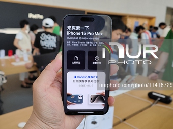 Customers are shopping for the iPhone 15 at the flagship store of Apple Smart Products on Nanjing Road Pedestrian Street in Shanghai, China,...