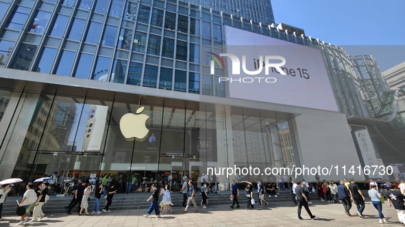 Customers are shopping for the iPhone 15 at the flagship store of Apple Smart Products on Nanjing Road Pedestrian Street in Shanghai, China,...