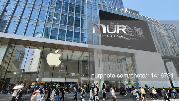 Customers are shopping for the iPhone 15 at the flagship store of Apple Smart Products on Nanjing Road Pedestrian Street in Shanghai, China,...