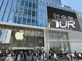 Customers are shopping for the iPhone 15 at the flagship store of Apple Smart Products on Nanjing Road Pedestrian Street in Shanghai, China,...