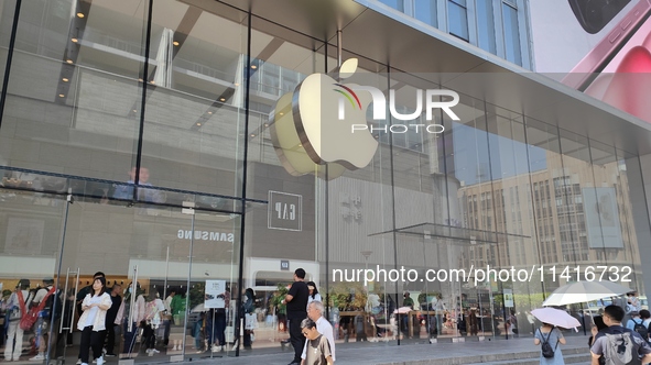 Customers are shopping for the iPhone 15 at the flagship store of Apple Smart Products on Nanjing Road Pedestrian Street in Shanghai, China,...