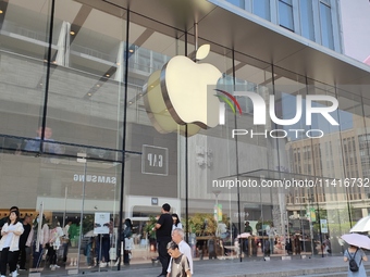 Customers are shopping for the iPhone 15 at the flagship store of Apple Smart Products on Nanjing Road Pedestrian Street in Shanghai, China,...