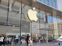 Customers are shopping for the iPhone 15 at the flagship store of Apple Smart Products on Nanjing Road Pedestrian Street in Shanghai, China,...