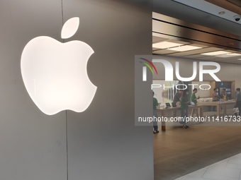 Customers are shopping for the iPhone 15 at the flagship store of Apple Smart Products on Nanjing Road Pedestrian Street in Shanghai, China,...