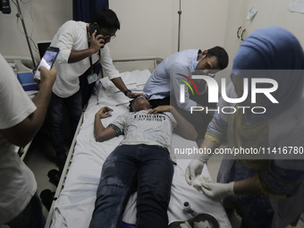 Injured anti-quota students are taking treatment at a hospital in Dhaka, Bangladesh, on July 18, 2024. (