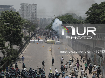 Anti-quota protestors and police are engaging in a clash in Dhaka, Bangladesh, on July 18, 2024. (