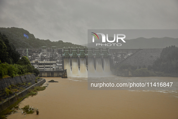 Daecheong Dam is discharging 500 tons of water per second to lower the water level amid heavy rain in Cheongju, around 140 kilometers south...