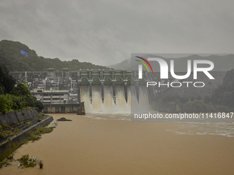 Daecheong Dam is discharging 500 tons of water per second to lower the water level amid heavy rain in Cheongju, around 140 kilometers south...