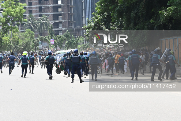 Students are clashing with the police during an ongoing anti-quota protest in Dhaka, Bangladesh, on July 18, 2024. 