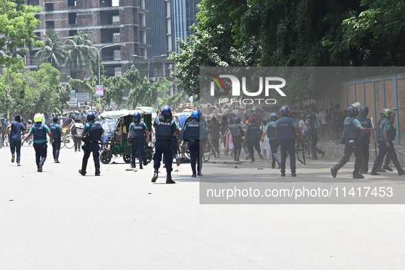 Students are clashing with the police during an ongoing anti-quota protest in Dhaka, Bangladesh, on July 18, 2024. 