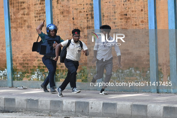 Students are clashing with the police during an ongoing anti-quota protest in Dhaka, Bangladesh, on July 18, 2024. 