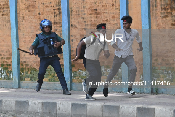 Students are clashing with the police during an ongoing anti-quota protest in Dhaka, Bangladesh, on July 18, 2024. 