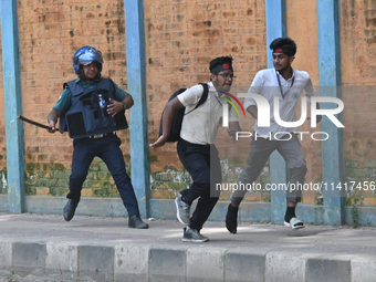 Students are clashing with the police during an ongoing anti-quota protest in Dhaka, Bangladesh, on July 18, 2024. (