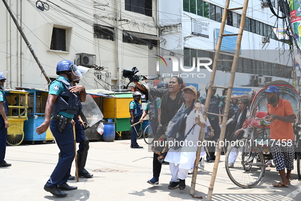 Students are clashing with the police during an ongoing anti-quota protest in Dhaka, Bangladesh, on July 18, 2024. 