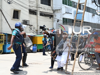 Students are clashing with the police during an ongoing anti-quota protest in Dhaka, Bangladesh, on July 18, 2024. (