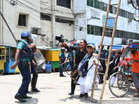 Students are clashing with the police during an ongoing anti-quota protest in Dhaka, Bangladesh, on July 18, 2024. (