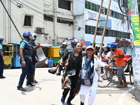 Students are clashing with the police during an ongoing anti-quota protest in Dhaka, Bangladesh, on July 18, 2024. (