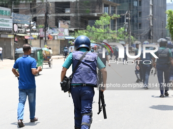 Students are clashing with the police during an ongoing anti-quota protest in Dhaka, Bangladesh, on July 18, 2024. (