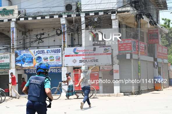 Students are clashing with the police during an ongoing anti-quota protest in Dhaka, Bangladesh, on July 18, 2024. 