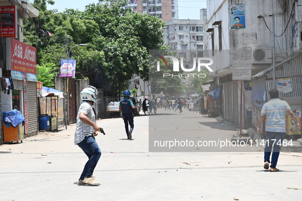 Students are clashing with the police during an ongoing anti-quota protest in Dhaka, Bangladesh, on July 18, 2024. 