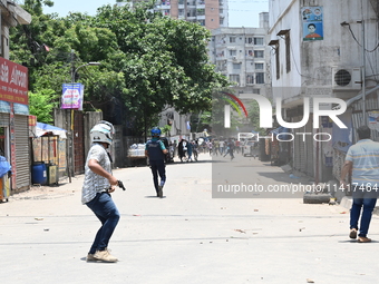 Students are clashing with the police during an ongoing anti-quota protest in Dhaka, Bangladesh, on July 18, 2024. (