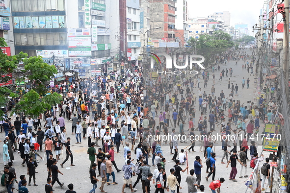 Students are clashing with the police during an ongoing anti-quota protest in Dhaka, Bangladesh, on July 18, 2024. 