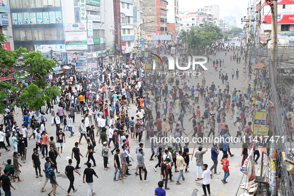 Students are clashing with the police during an ongoing anti-quota protest in Dhaka, Bangladesh, on July 18, 2024. 