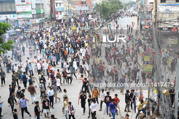 Students are clashing with the police during an ongoing anti-quota protest in Dhaka, Bangladesh, on July 18, 2024. 