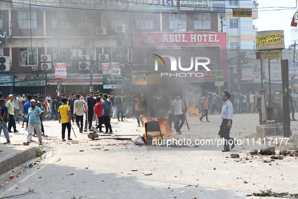 Students are clashing with the police during an ongoing anti-quota protest in Dhaka, Bangladesh, on July 18, 2024. 