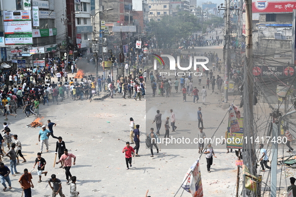 Students are clashing with the police during an ongoing anti-quota protest in Dhaka, Bangladesh, on July 18, 2024. 