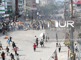 Students are clashing with the police during an ongoing anti-quota protest in Dhaka, Bangladesh, on July 18, 2024. (