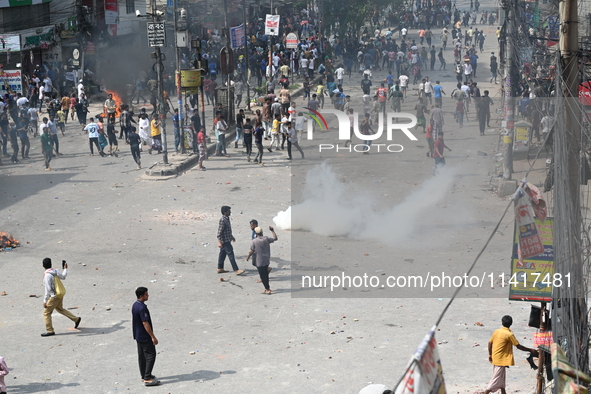 Students are clashing with the police during an ongoing anti-quota protest in Dhaka, Bangladesh, on July 18, 2024. 