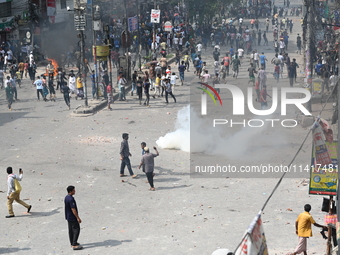 Students are clashing with the police during an ongoing anti-quota protest in Dhaka, Bangladesh, on July 18, 2024. (