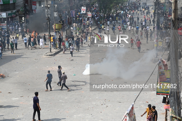 Students are clashing with the police during an ongoing anti-quota protest in Dhaka, Bangladesh, on July 18, 2024. 