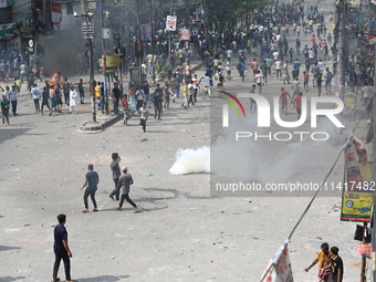 Students are clashing with the police during an ongoing anti-quota protest in Dhaka, Bangladesh, on July 18, 2024. (