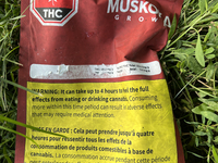 A discarded package from an edible cannabis product is lying on the ground near a playground in Toronto, Ontario, Canada, on July 16, 2024....