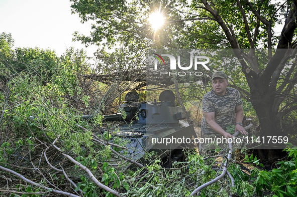 Andrii, a commander of an artillery crew of the 24th King Danylo Separate Mechanized Brigade, is carrying out a combat mission near Chasiv Y...