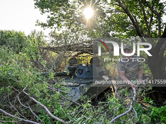 Andrii, a commander of an artillery crew of the 24th King Danylo Separate Mechanized Brigade, is carrying out a combat mission near Chasiv Y...